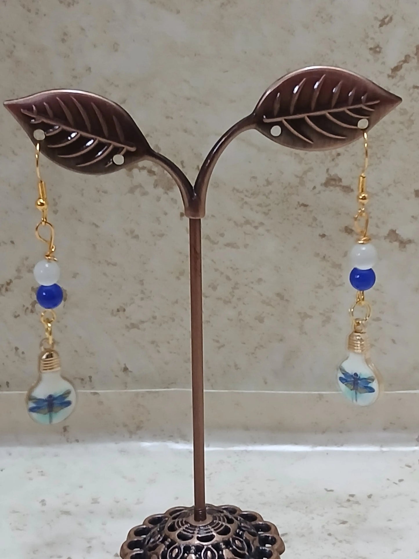Painted dragonfly dangle earrings done in blues on white with gold hardware - Crazy Cat Lady Crafts