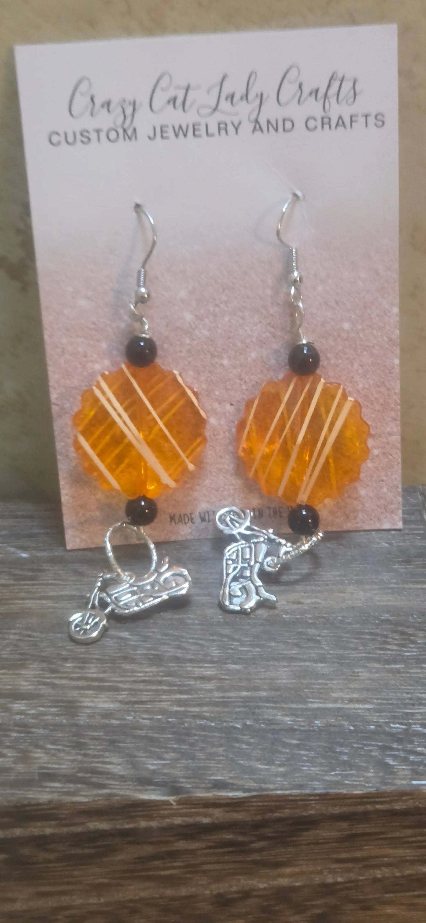 Orange and white flower shaped beads and black beads motorcycle dangle earrings - Crazy Cat Lady Crafts