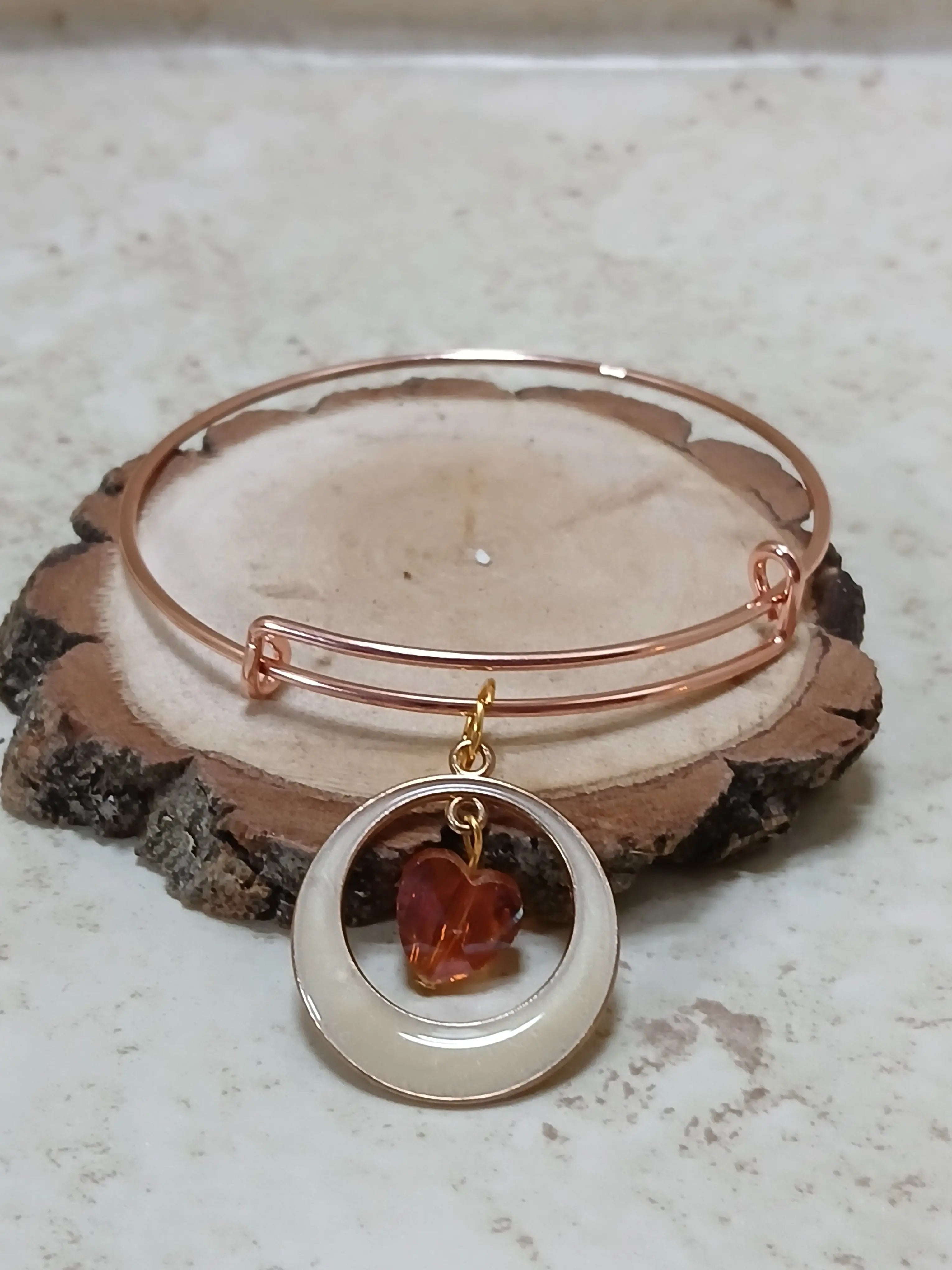 Rose gold adjustable bangle bracelet with round charm with white on the edge and a orange heart inmiddle - Crazy Cat Lady Crafts