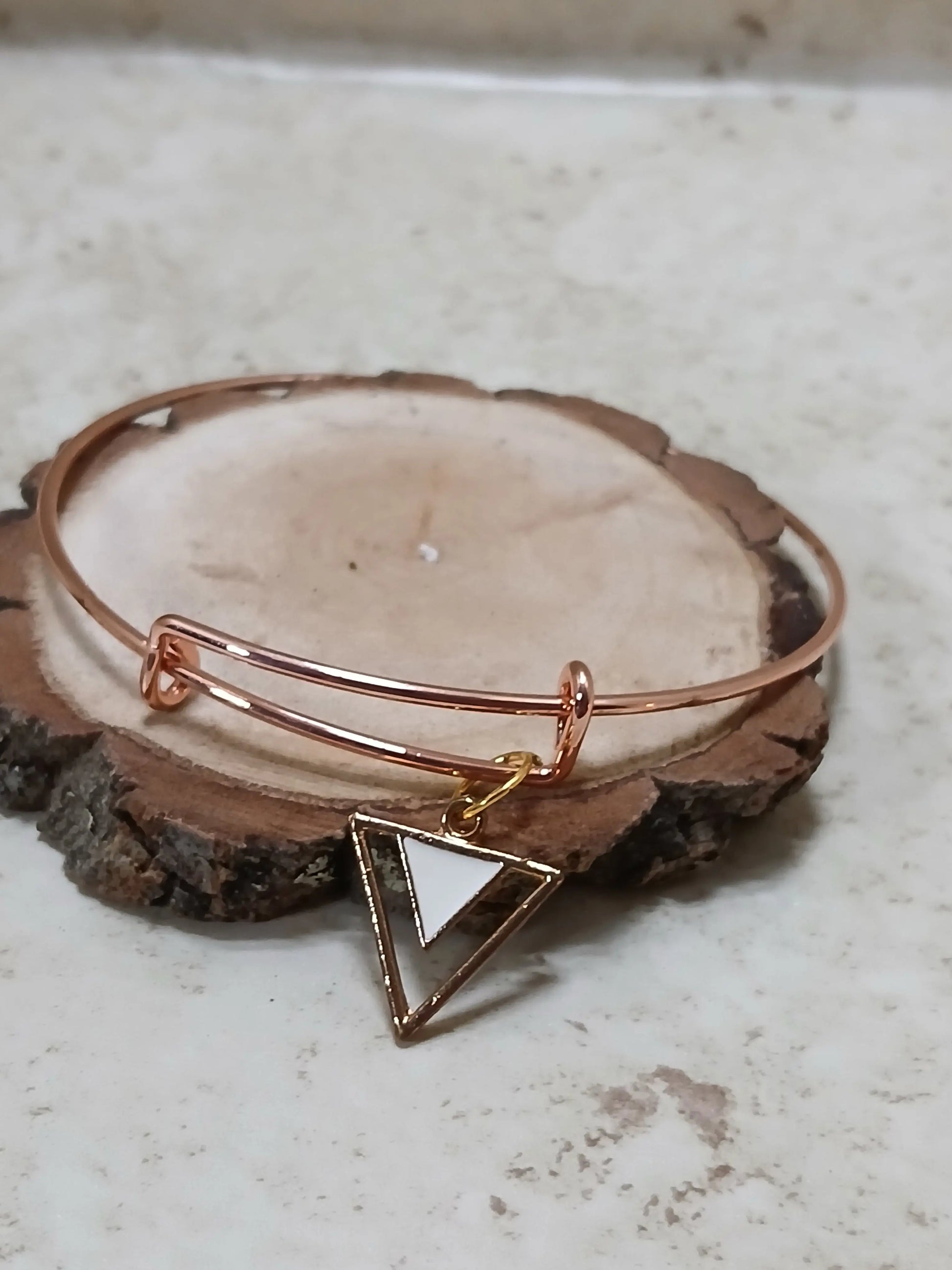Rose gold adjustable bangle bracelet with a gold triangle with a white middle charm - Crazy Cat Lady Crafts