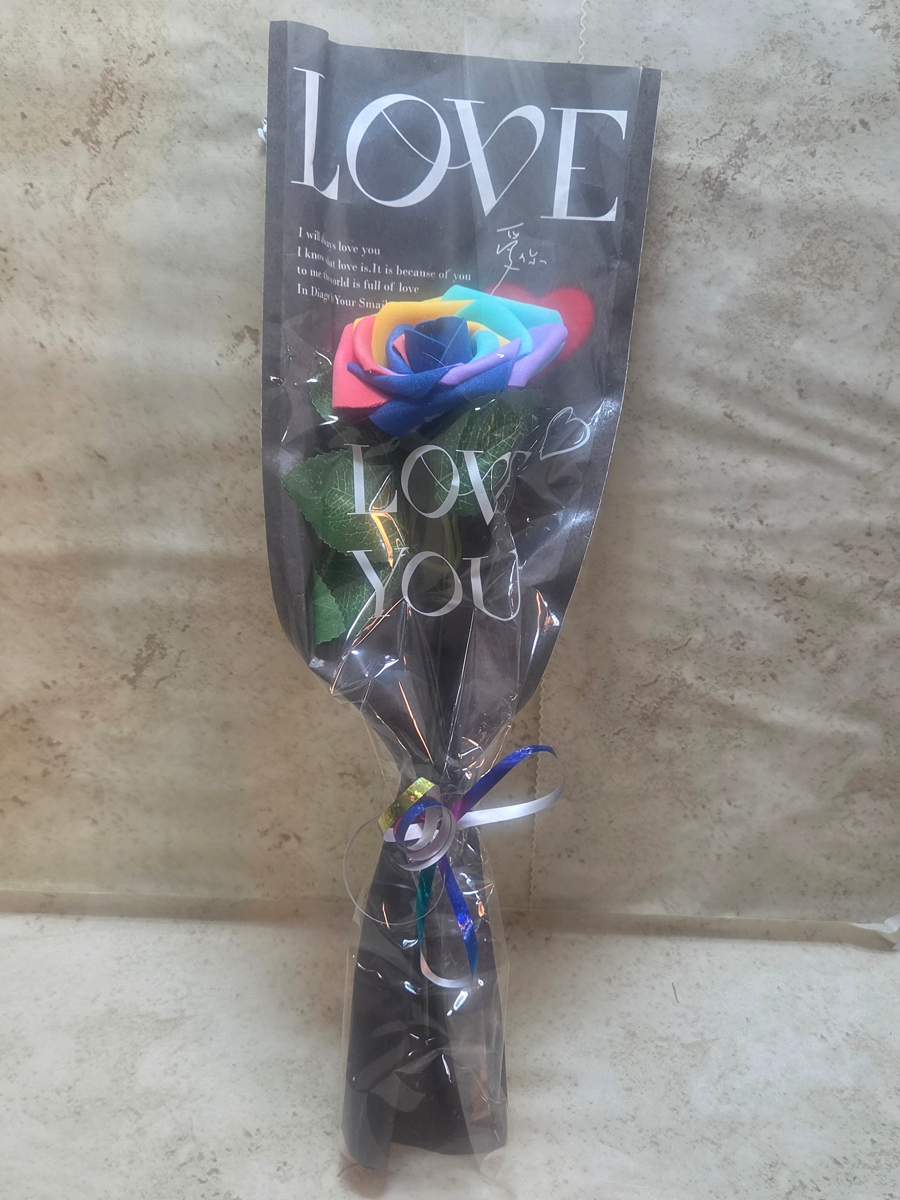 Rainbow foam roses in a black and white I love you bud bag