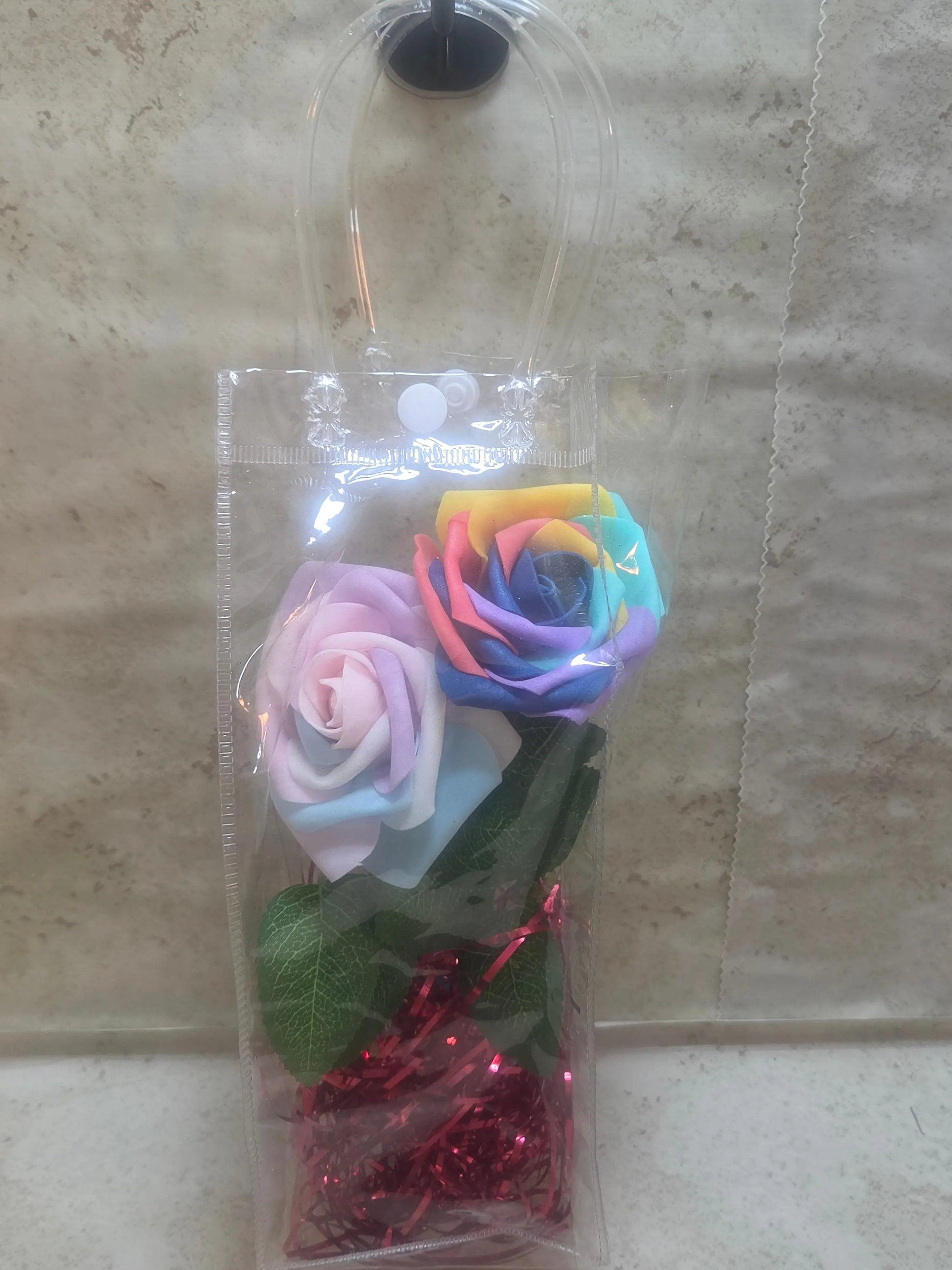 12 inch clear plastic bag with handles has 2 foam roses a gradient and rainbow inside - Crazy Cat Lady Crafts