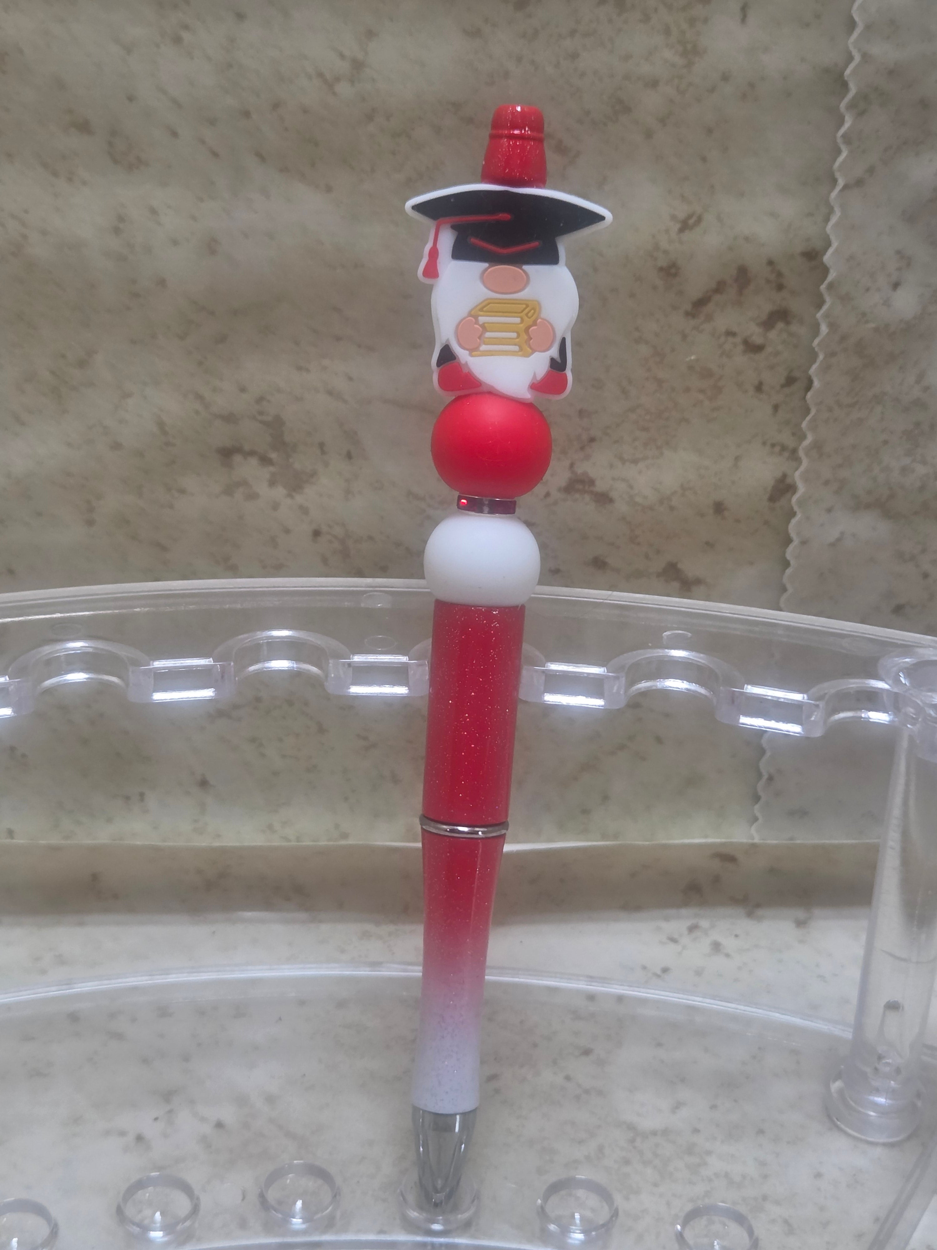 Red and white graduation gnome pen