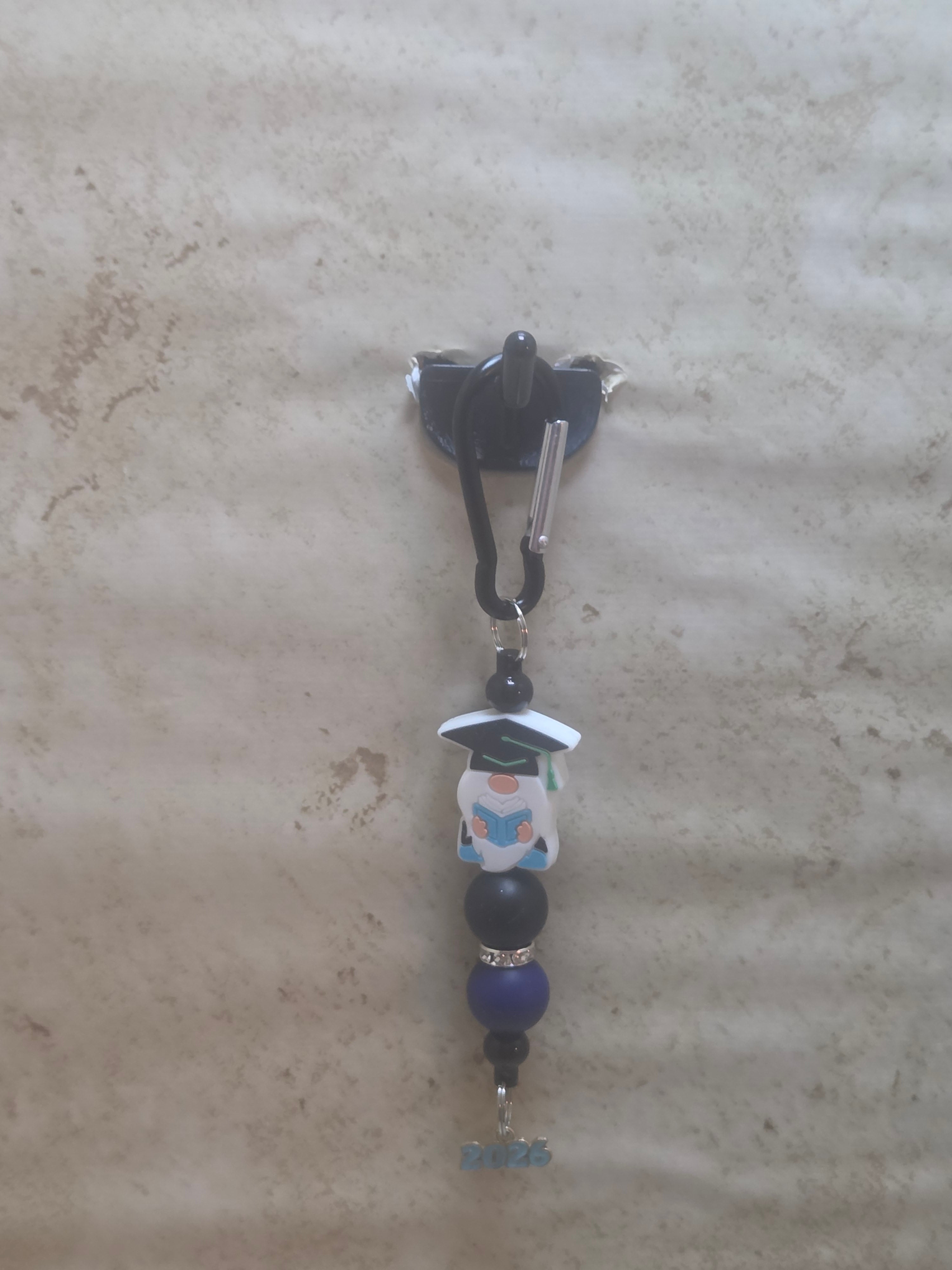 Black and blue graduation gnome clip bag tag with blue 2026 charm