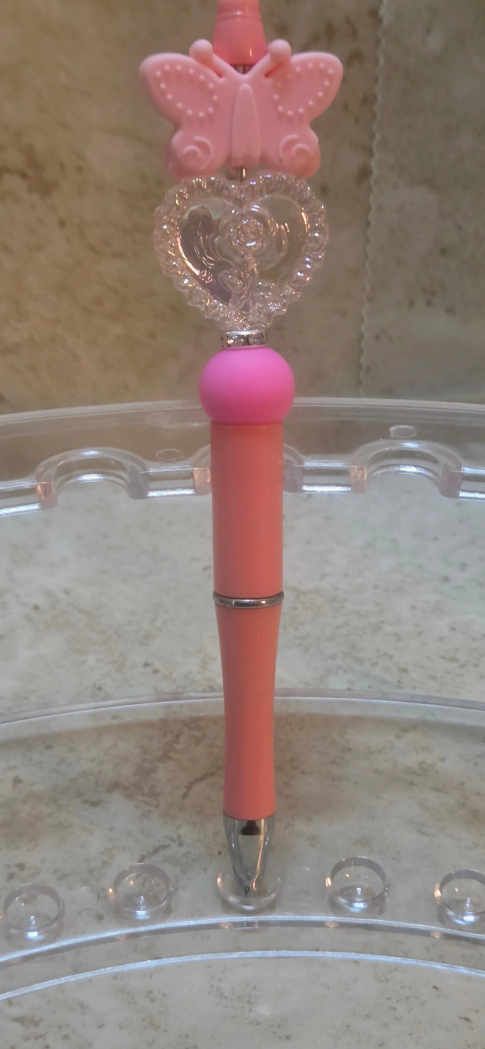 pink silicone butterfly and clear engraved heart shaped beads with a rose pen - Crazy Cat Lady Crafts