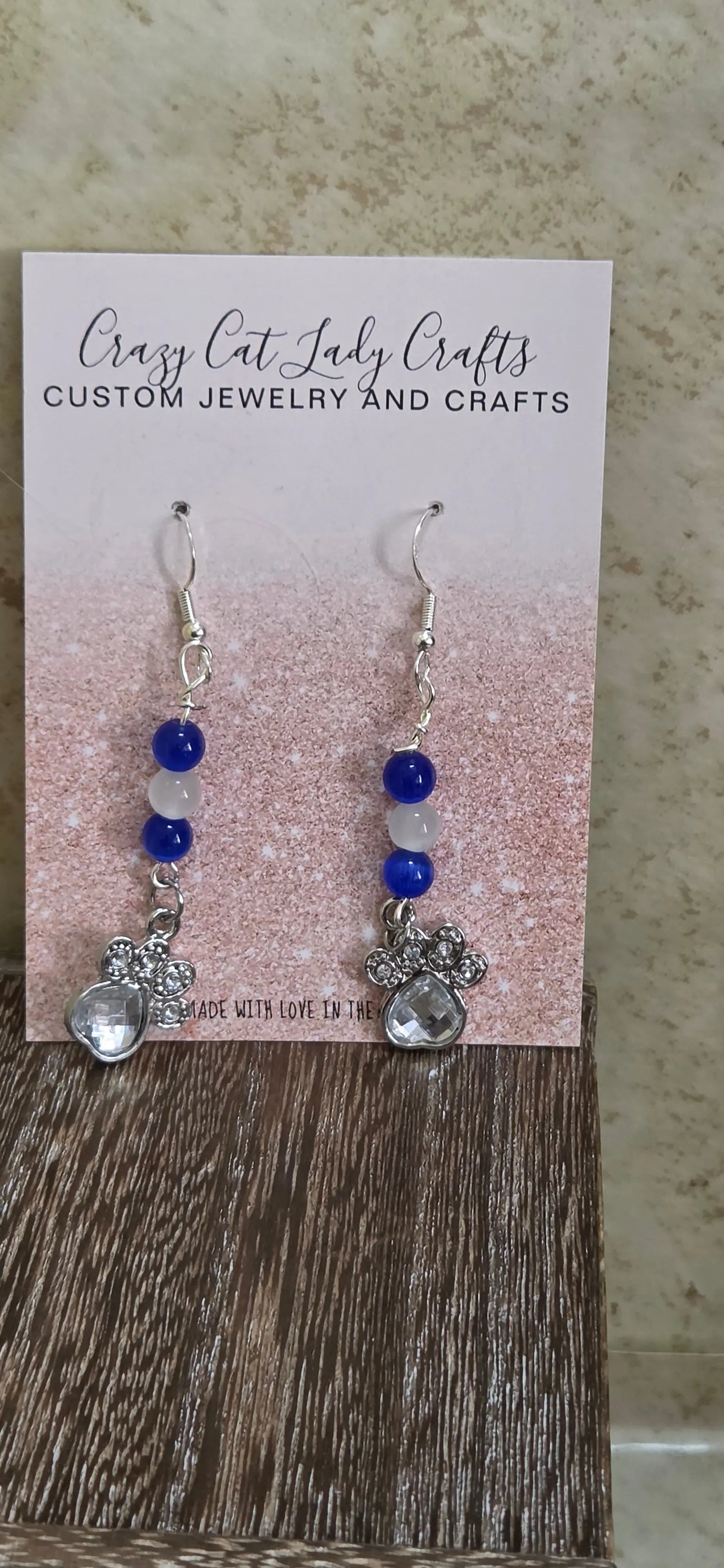 Blue and white beaded earrings with paw print of rhinestones - Crazy Cat Lady Crafts