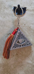 Silver evil  in a triangle and a multi colored tassel key chian - Crazy Cat Lady Crafts