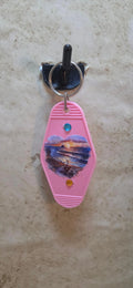 replica hotel key ring in pink and has a beach scene in a heart shape - Crazy Cat Lady Crafts