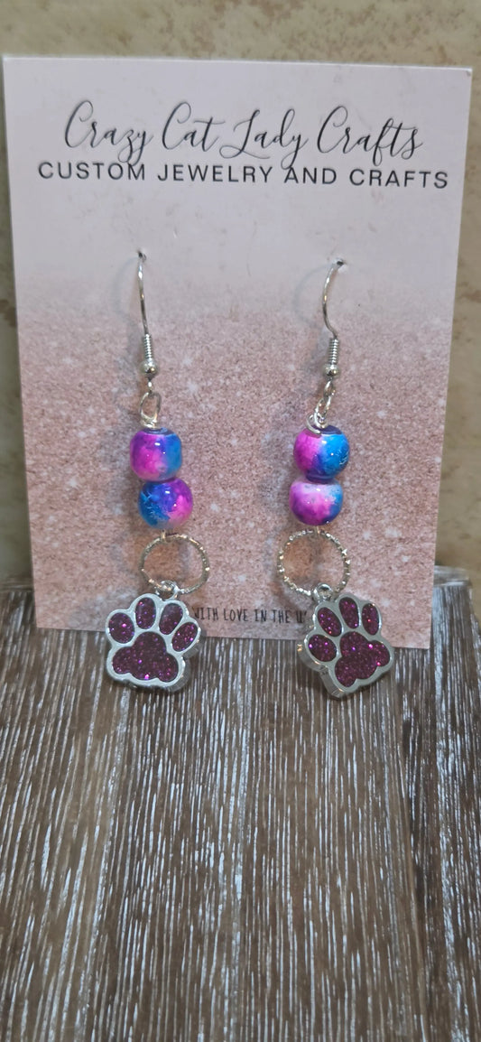 Blue and pink tye dye looking beads and dark pink paw print charm earrings - Crazy Cat Lady Crafts