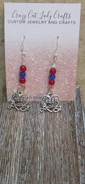 Red and blue with silver charm that says cheerleading earrings - Crazy Cat Lady Crafts