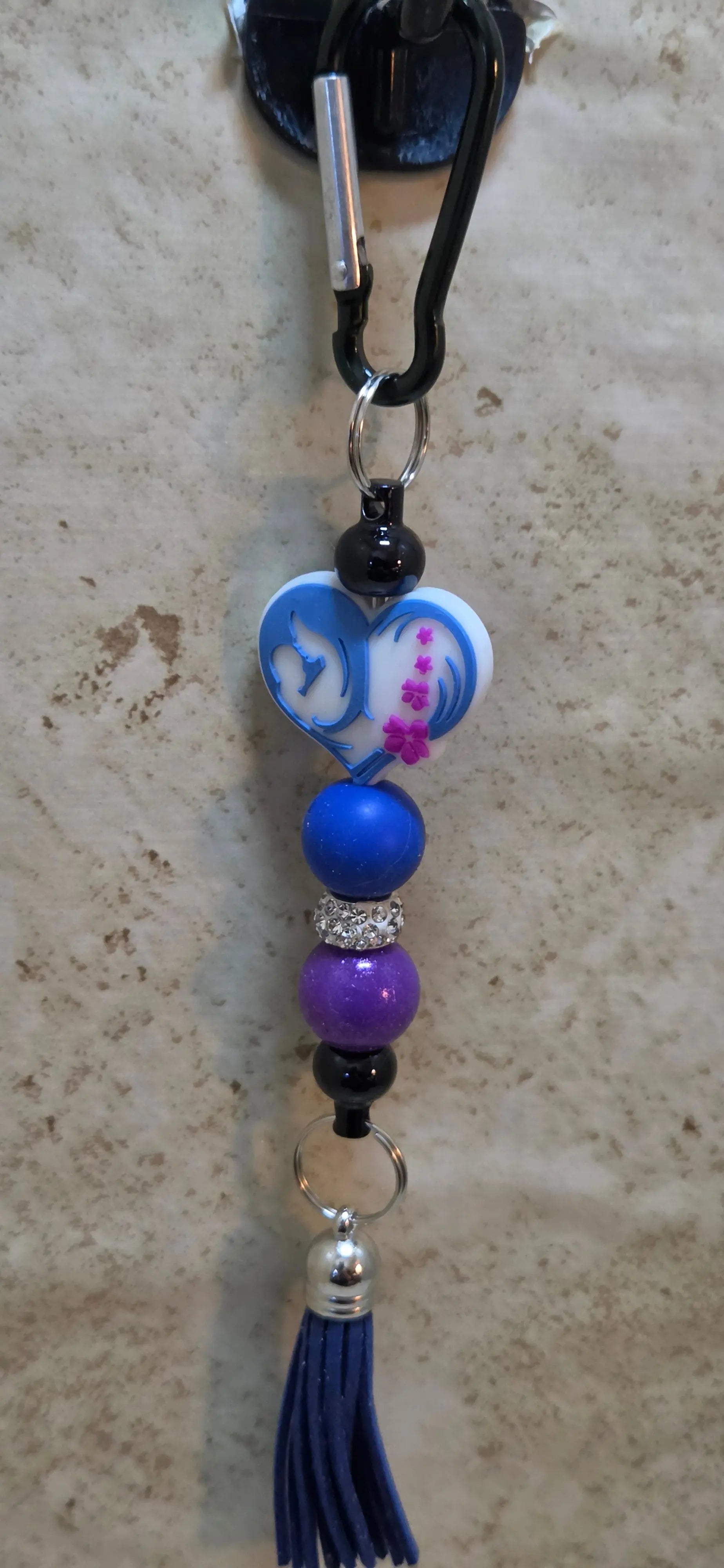 A mother and child in a heart shaped silicone beaded bag tag - Crazy Cat Lady Crafts