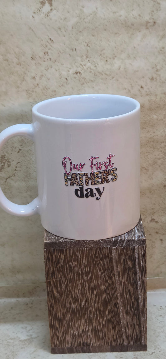11 ounce white coffee mug with our first fathers day design