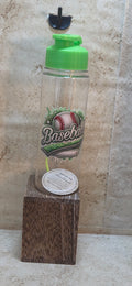 17 ounce clear water bottle with green flip top lid and strap with green baseball design