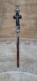 Black cross with white lettering says Jesus and 2 fancy beaded letter opener