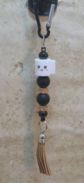 Smiling silicone toilet paper charm with beads and tassel bag tag