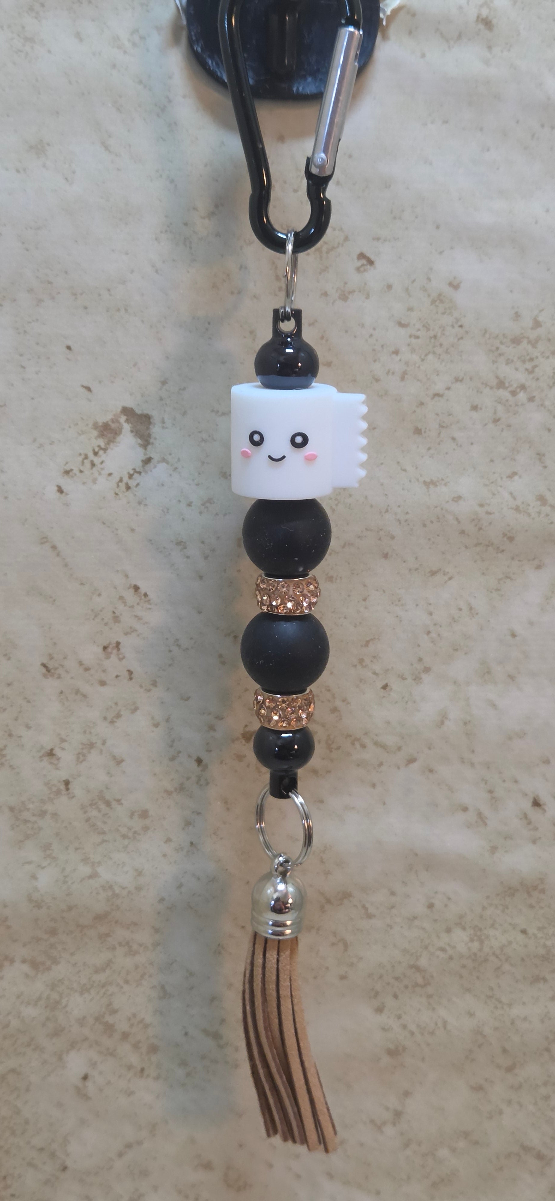 Smiling silicone toilet paper charm with beads and tassel bag tag