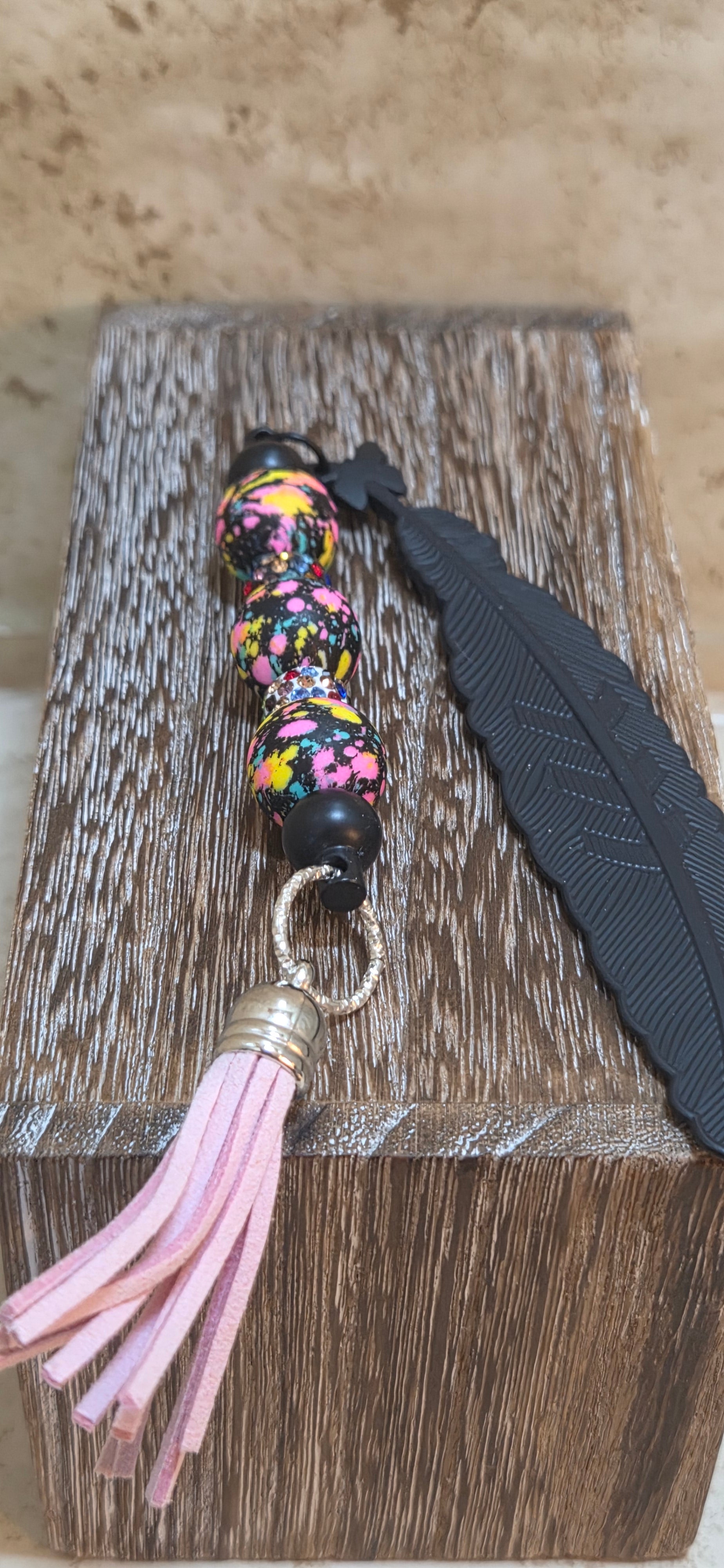 Black silicone feather and beaded book mark with tassel