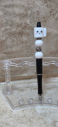 Silicone smiling toilet paper in white and black and white silicone and 2 silver beaded pen