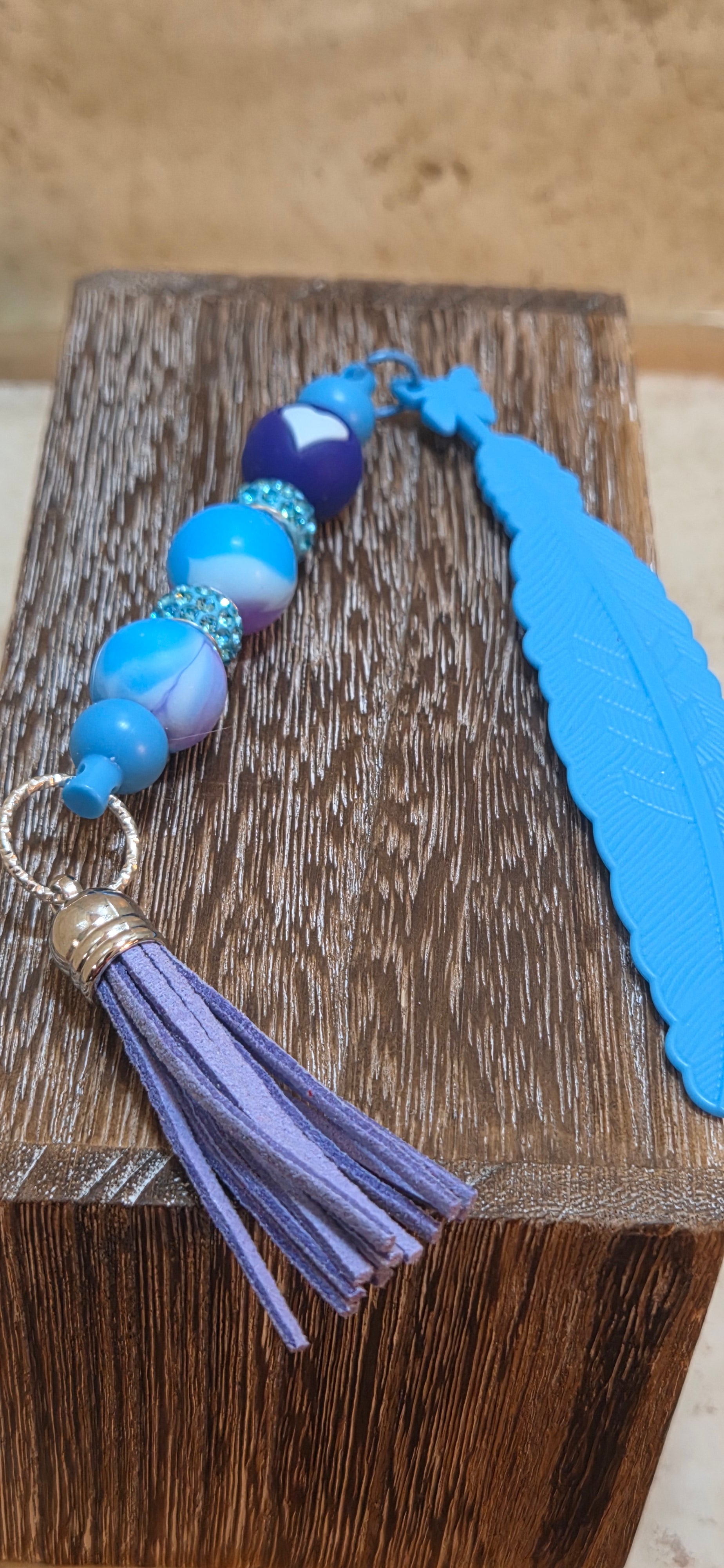 Blue silicone feather beaded bookmark with tassel