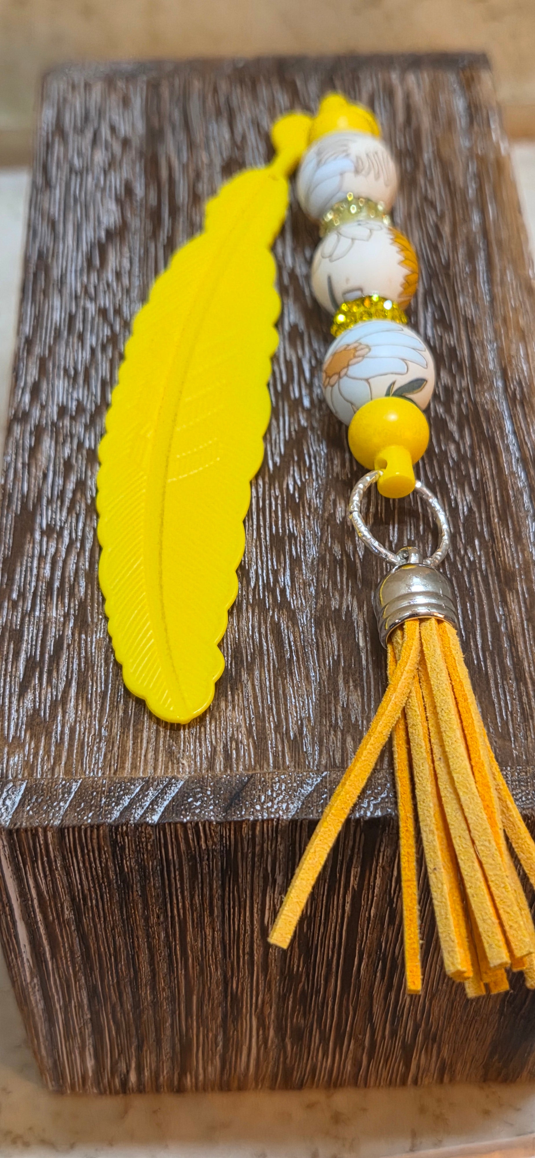 Yellow silicone feather beaded bookmark with tassel