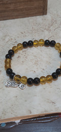 Larger size yellow and black stretchy bracelet in size 8.5 with silver motorcycle charm