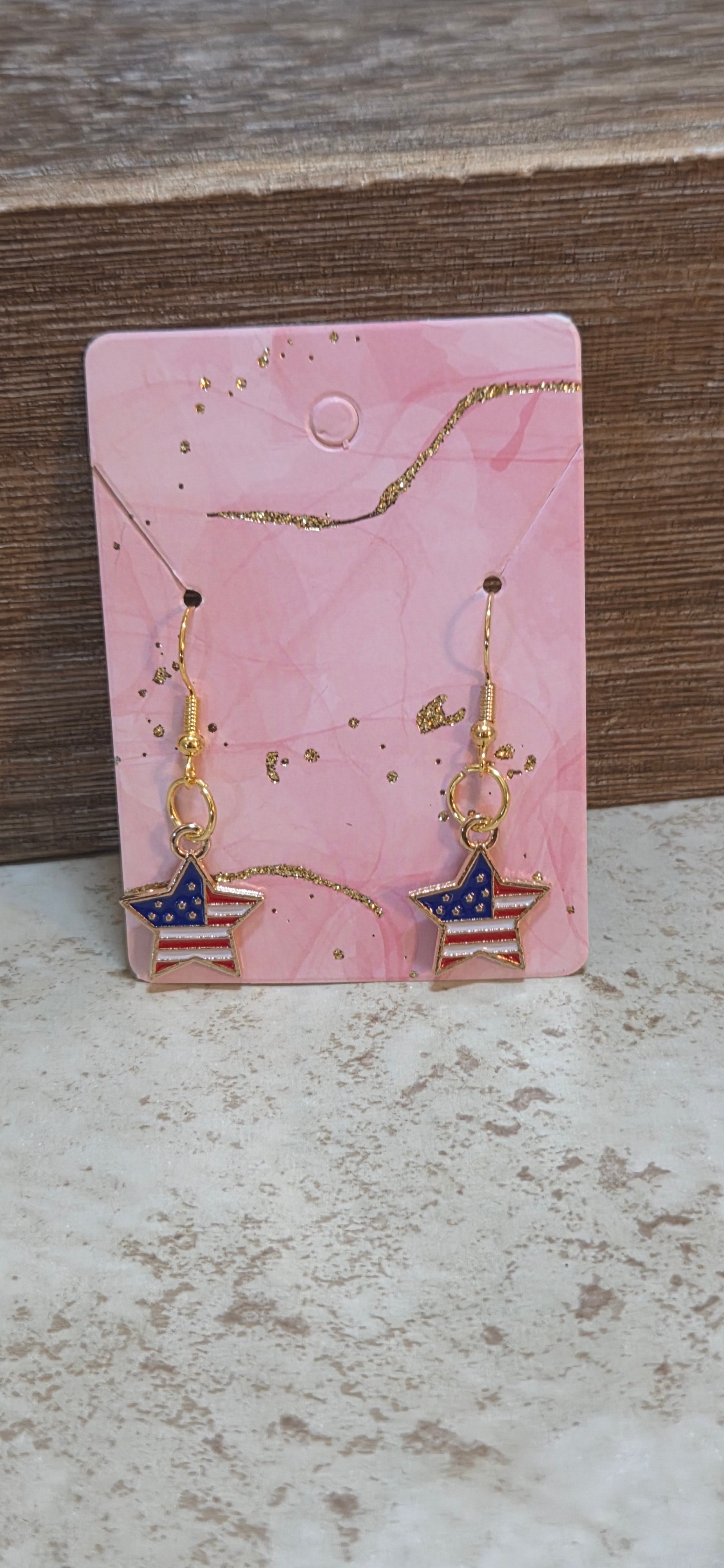 American flag and gold star shaped dangle earring
