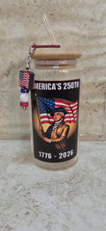 handcrafted glass jar with america's 250th with a minute man and a flag charm in a black box