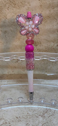 Pink and white bring on the sparkle and bling butterfly beaded pen