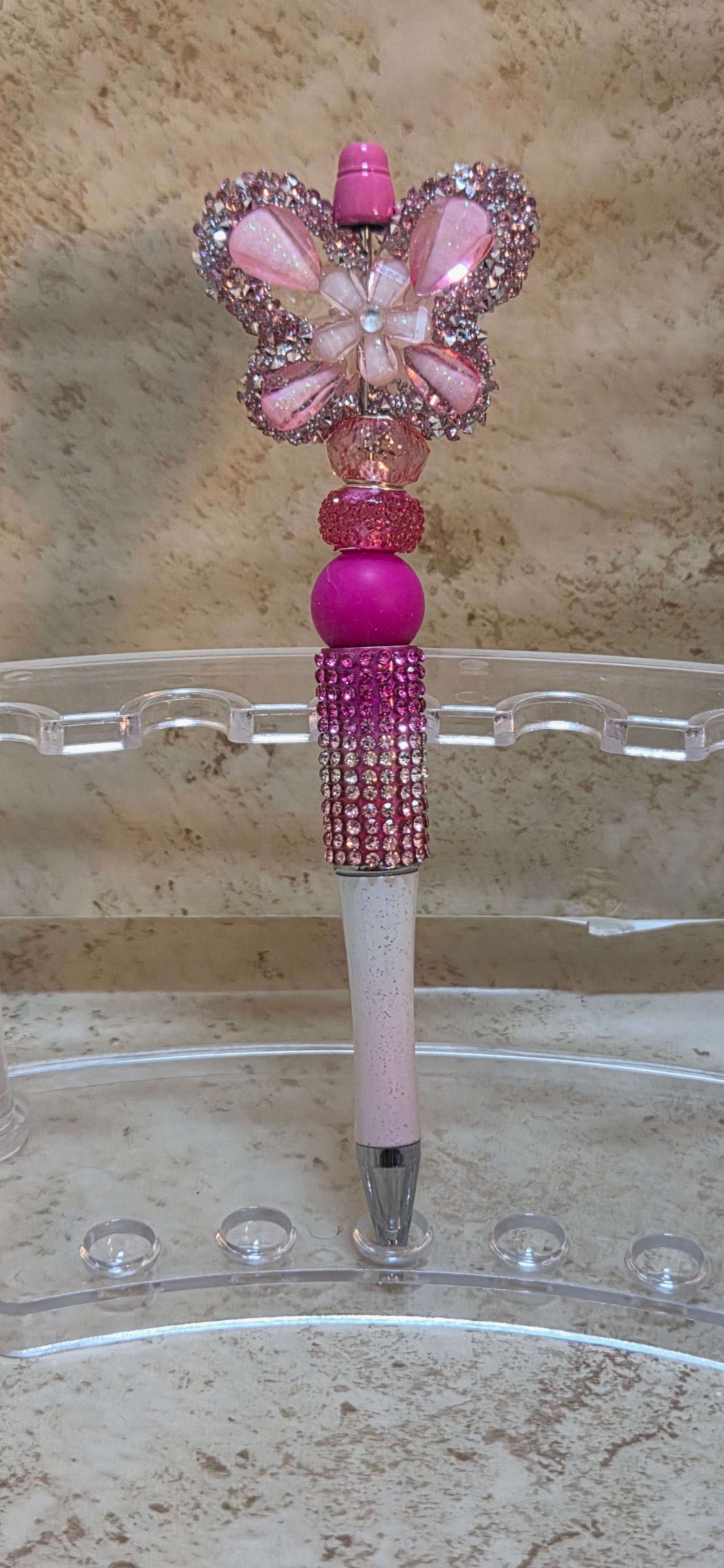 Pink and white bring on the sparkle and bling butterfly beaded pen