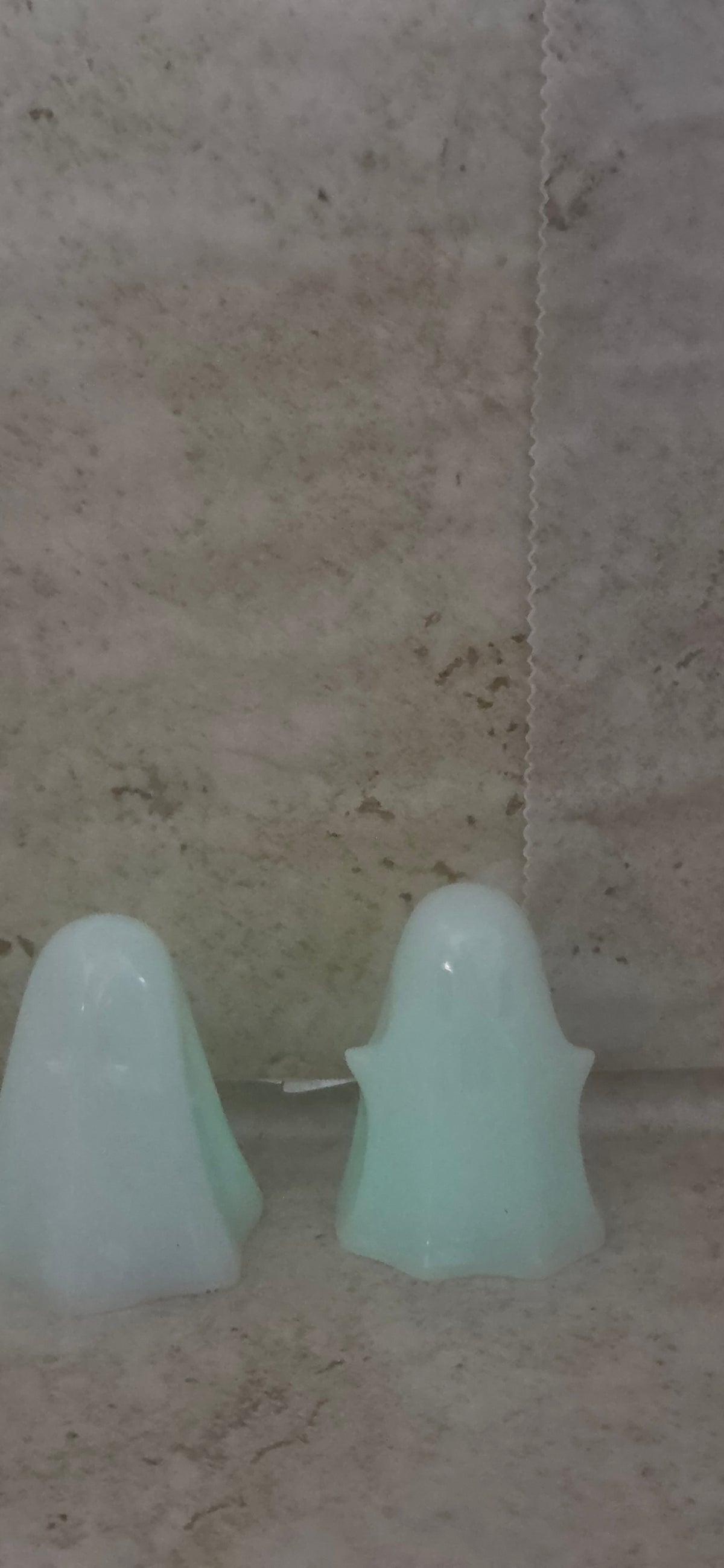 Pair of 3 inch glow in the dark resin ghosts