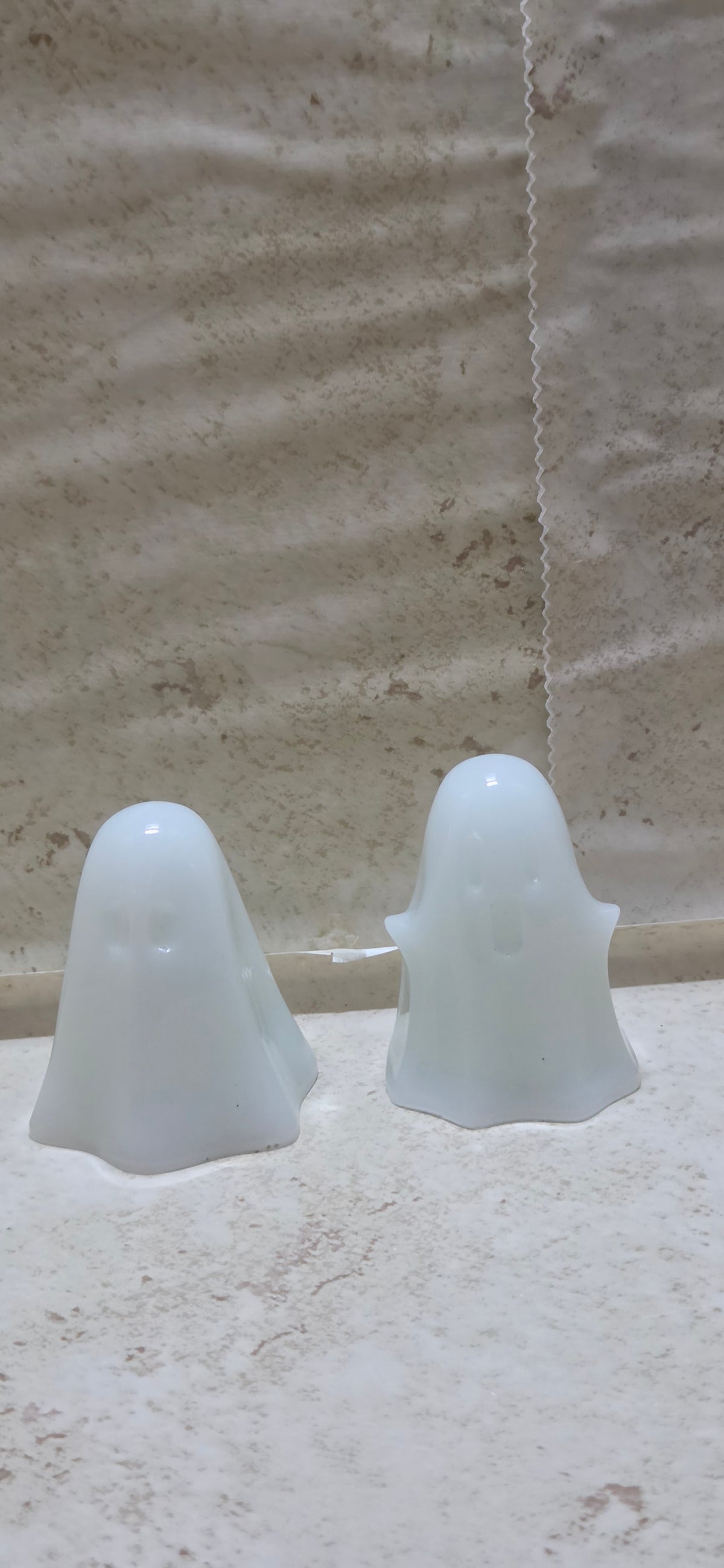 Pair of 3 inch glow in the dark resin ghosts