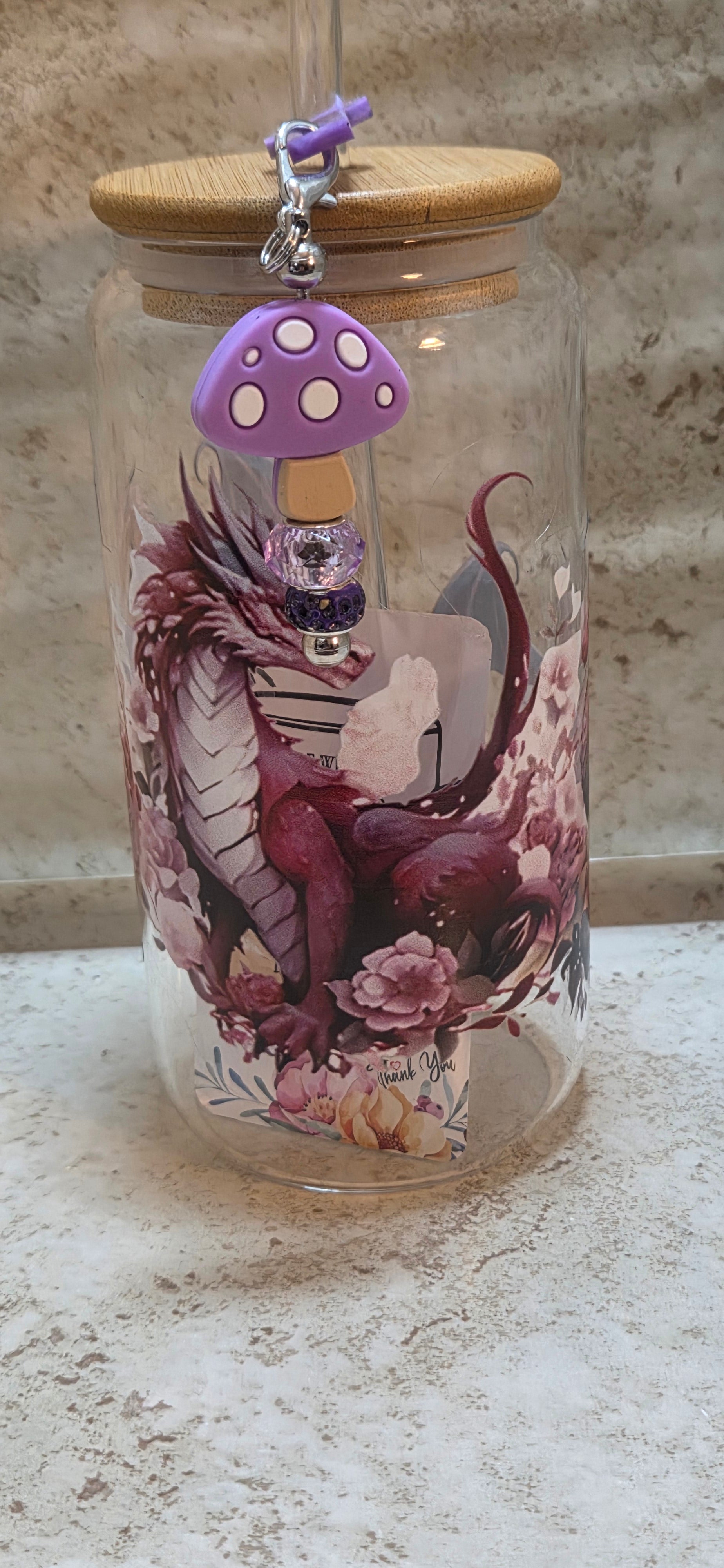 16 oz glass tumbler with purple dragon design and mushroom charm