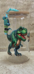 16 oz glass tumbler with green dinosaur design and dinosaur charm